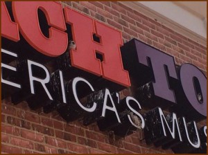 Birds roosting on sign